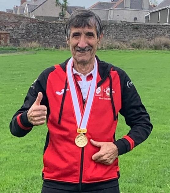 Micky Algieri proudly shows off his World Cup Medal